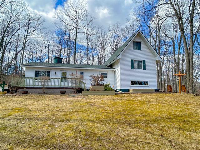 front view picture of 212 Cindy Avenue, Roscommon, MI. 48653
