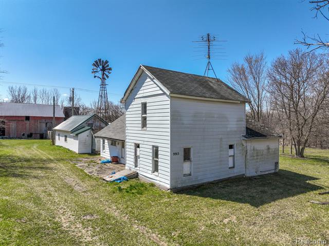 front view picture of 9915 Van Buren Road, Fowlerville, MI. 48836