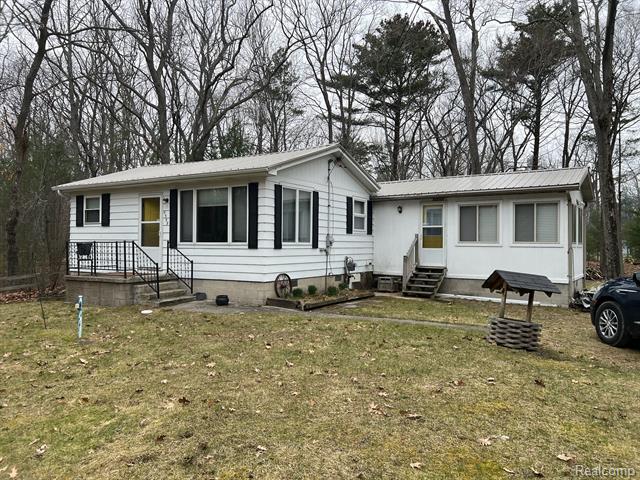 front view picture of 5349 E 8Th Street, Au Gres, MI. 48703