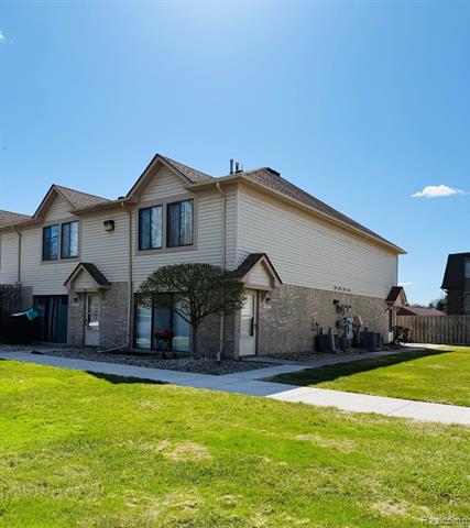 front view picture of 38597 Wellington Drive, Clinton Township, MI. 48036