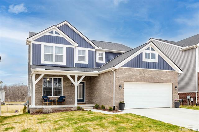 front view picture of 58790 Sella Drive, South Lyon, MI. 48178