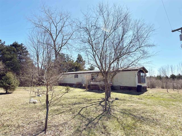 front view picture of 6100 Snover Road, Carsonville, MI. 48419