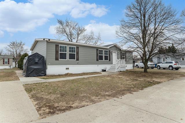 front view picture of 9008 Brickersville Drive, West Olive, MI. 49460