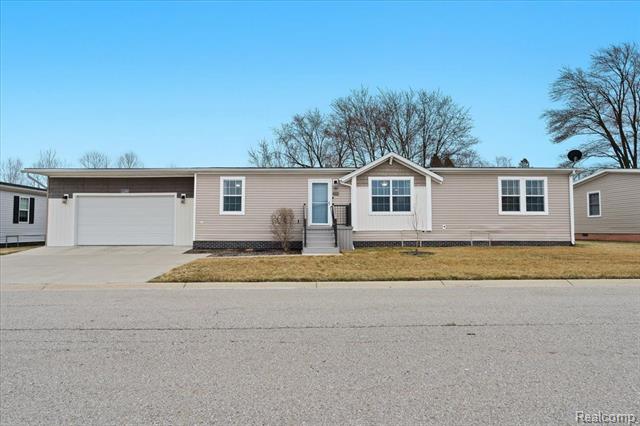front view picture of 11209 Spring Arbor, South Lyon, MI. 48178