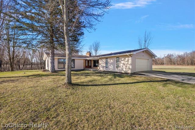 front view picture of 8603 N Owosso Road, Fowlerville, MI. 48836