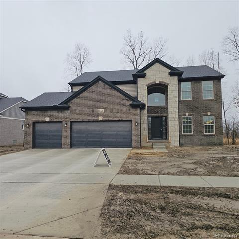front view picture of 50725 Timberstone Drive, Macomb, MI. 48042