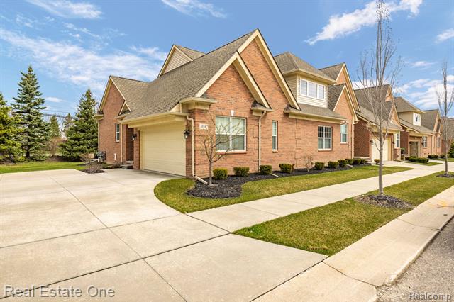 front view picture of 48582 Eastbridge Drive, Canton, MI. 48188
