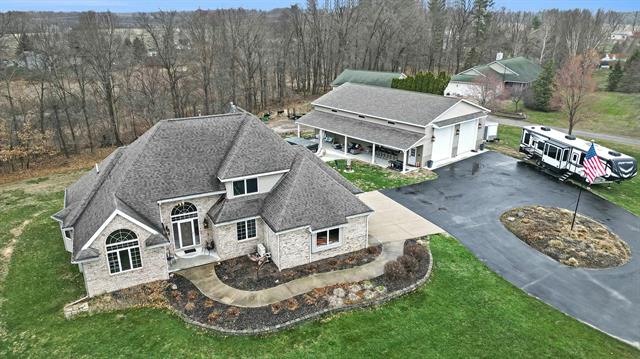front view picture of 5621 Tiffany Avenue Ne, Rockford, MI. 49341