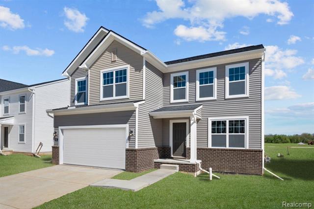 front view picture of 651 Countryside Drive, Chelsea, MI. 48118