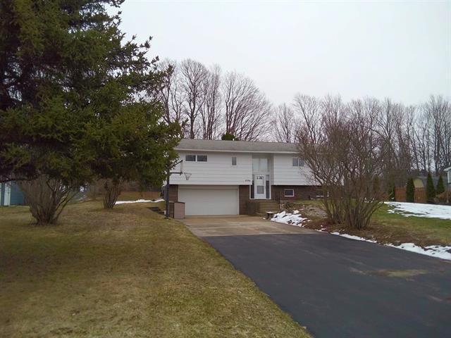 front view picture of 4396 Foxfire Drive, Traverse City, MI. 49684