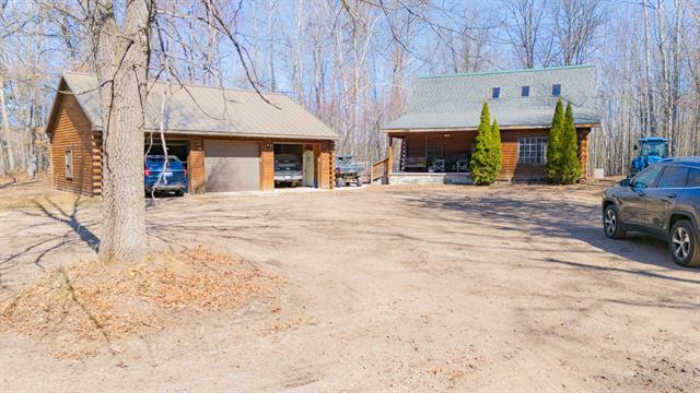front view picture of 10090 Snowbowl Road, Houghton Lake, MI. 48629