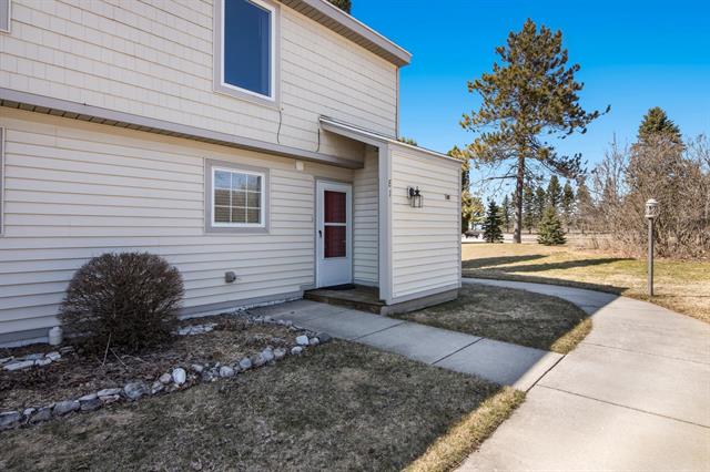 front view picture of 5000 Townehouse Drive, Cedar, MI. 49621