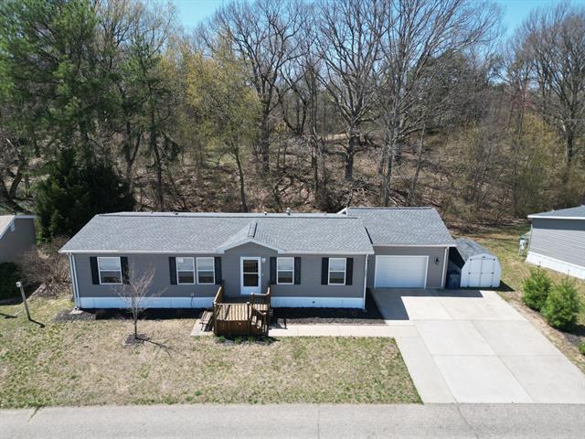 front view picture of 8687 Muirfield Drive, West Olive, MI. 49460