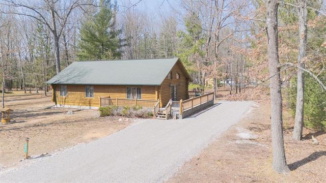 front view picture of 807 Deer Run, Prudenville, MI. 48651