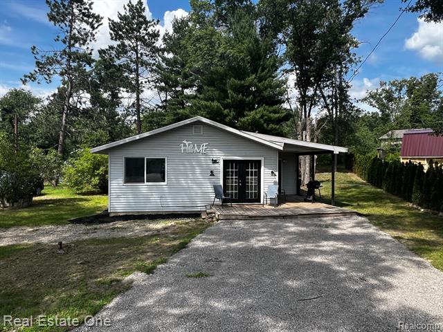 front view picture of 1623 N Ogemaw Trail, West Branch, MI. 48661
