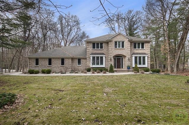 front view picture of 1975 Timber Ridge Drive Se, Ada, MI. 49301
