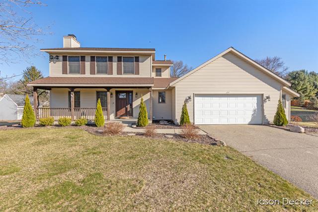 front view picture of 7263 11 Mile Road Ne, Rockford, MI. 49341