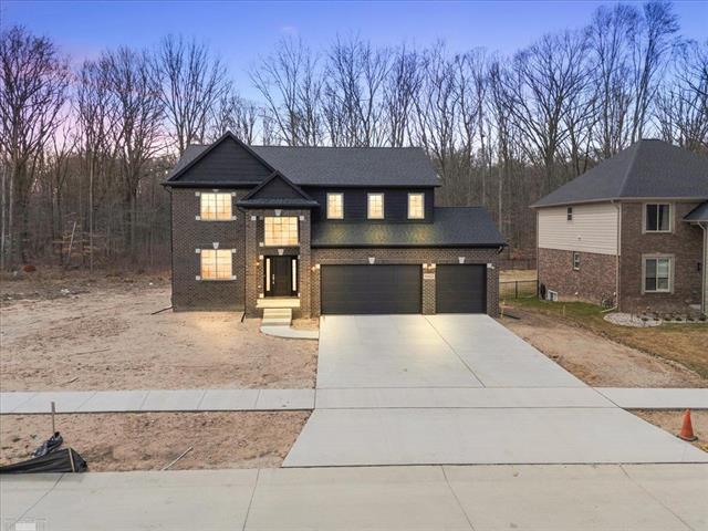 front view picture of 50423 Oakbrooke Drive, New Baltimore, MI. 48047