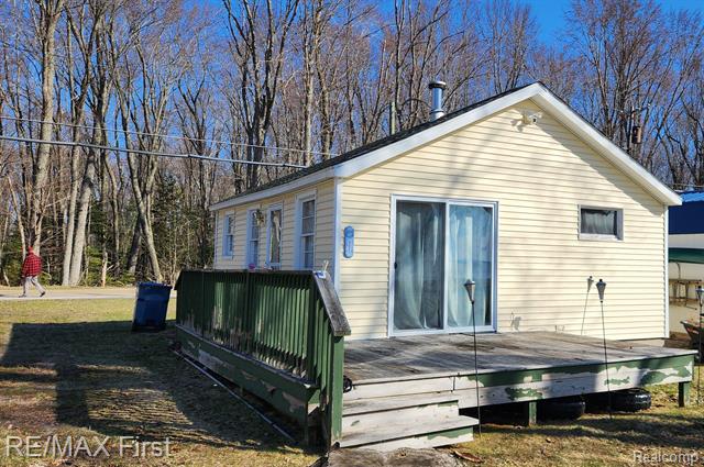 front view picture of 217 Long Point Drive, Houghton Lake, MI. 48629