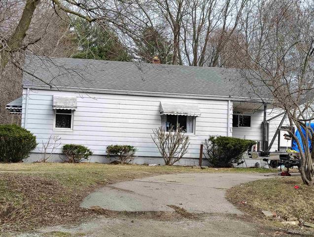 front view picture of 10400 Bray Road, Clio, MI. 48420
