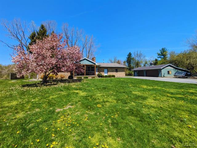 front view picture of 13936 Allen Road, Clinton, MI. 49236