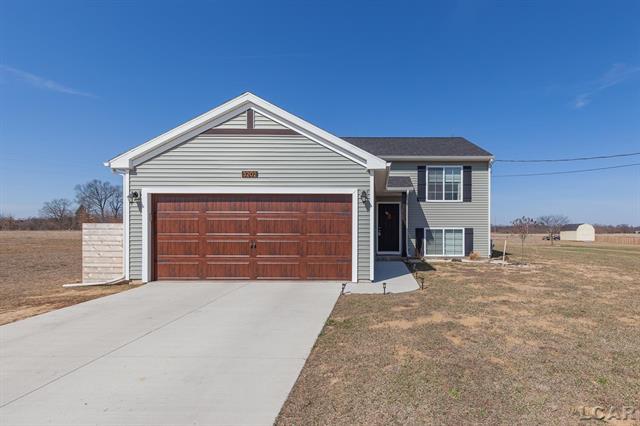 front view picture of 3202 Sutton Road, Adrian, MI. 49221