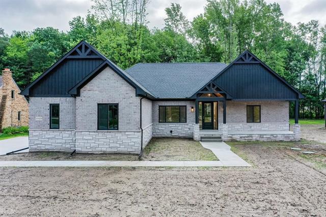 front view picture of 55420 Jewell Road, Utica, MI. 48315