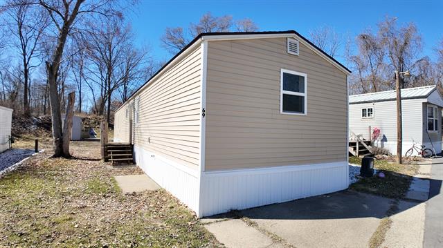 front view picture of 4747 West River Drive, Comstock Park, MI. 49321