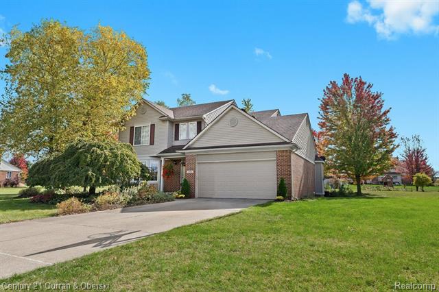 front view picture of 9009 N Pheasant Ridge Lane, Saline, MI. 48176