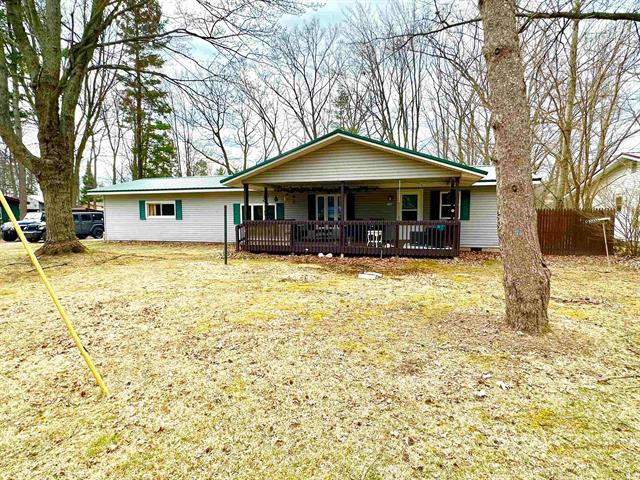 front view picture of 596 Green Street, Harrison, MI. 48625