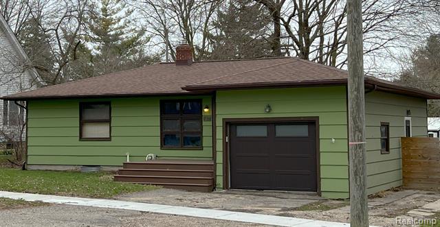 front view picture of 3877 N Mill Road, Dryden, MI. 48428