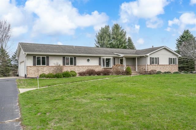 front view picture of 1200 N Wheaton Road, Charlotte, MI. 48813