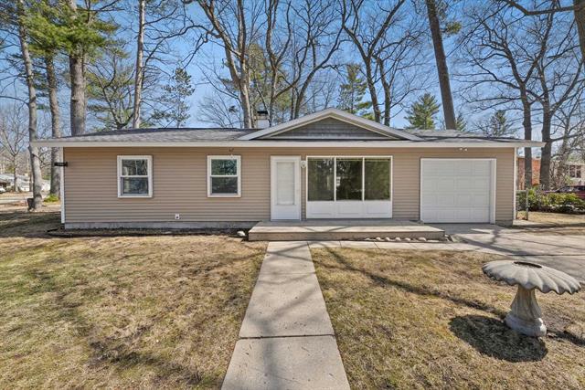 front view picture of 1700 Indian Woods Drive, Traverse City, MI. 49686