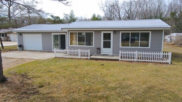 front view picture of 1695 Opland Road, Gladwin, MI. 48624