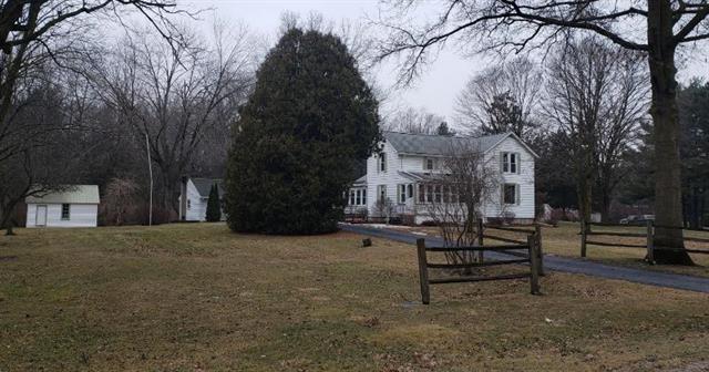 front view picture of 12090 Bunton Road, Willis, MI. 48191