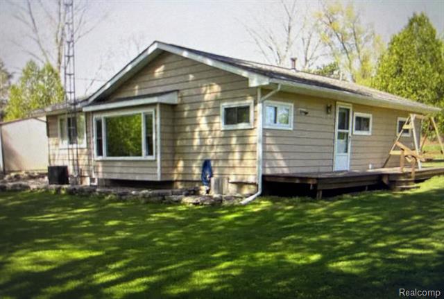 front view picture of 4633 Angling Road, Silverwood, MI. 48760
