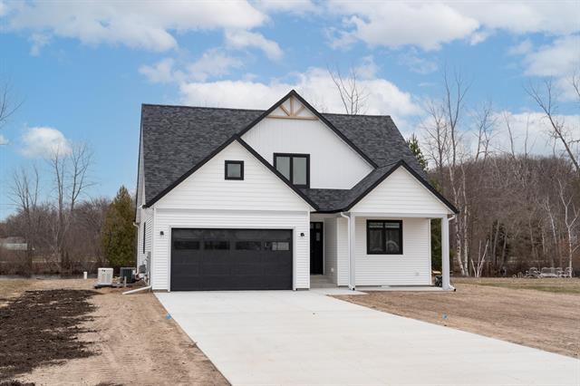 front view picture of 1008 Northview Drive, Weidman, MI. 48893