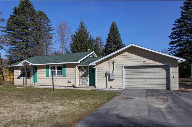 front view picture of 5937 Fourth Street, Bellaire, MI. 49615