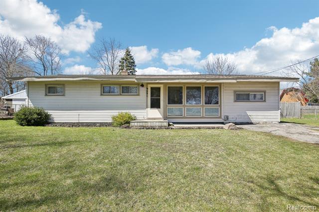 front view picture of 9091 Maplewood Drive, Clio, MI. 48420