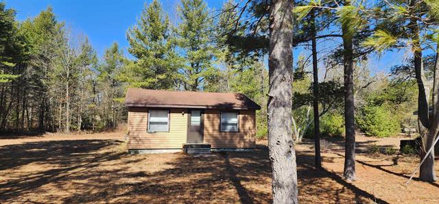 front view picture of 1051 Wintergreen Street, East Tawas, MI. 48730