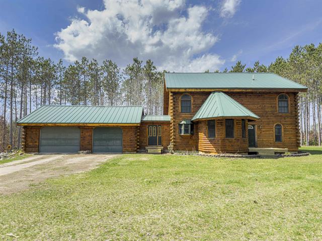front view picture of 753 W School Road, Weidman, MI. 48893