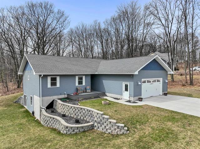 front view picture of 305 Bramblewood Drive, Cadillac, MI. 49601