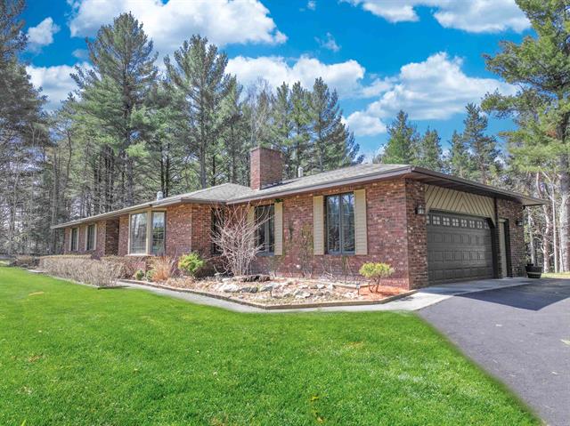 front view picture of 7021 Cook Road, Williamsburg, MI. 49690