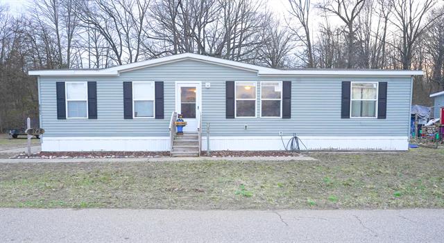 front view picture of 8747 Muirfield Drive, West Olive, MI. 49460