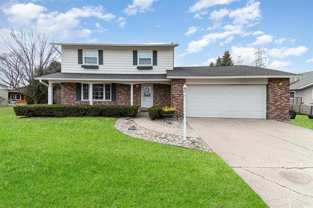 front view picture of 971 Cecelia Court, Essexville, MI. 48732
