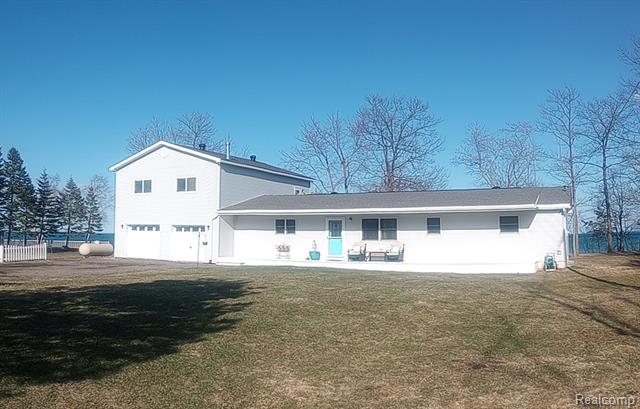 front view picture of 7166 Lighthouse Road, Port Hope, MI. 48468