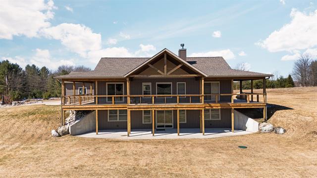 front view picture of 8496 Sw Hudson Road, Fife Lake, MI. 49633