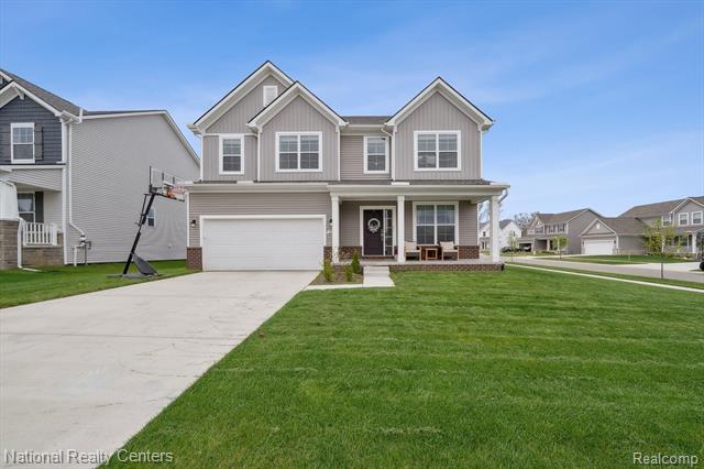 front view picture of 222 Quartz Way, White Lake, MI. 48386