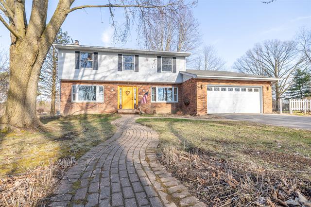 front view picture of 2383 Peckins Road, Chelsea, MI. 48118