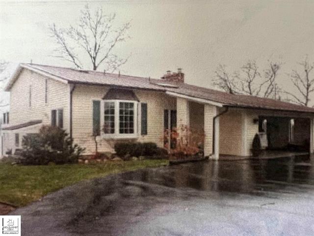front view picture of 9438 Island Drive, Goodrich, MI. 48438